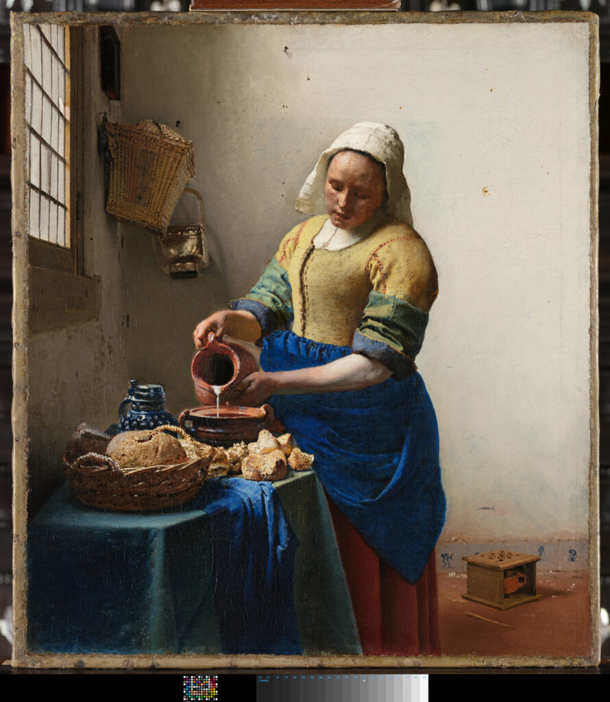 A giclée print giclée  Color3arte of Johannes Vermeer's "The Milkmaid," depicting a woman pouring milk in a domestic setting, rendered with precise detail and color for a high-quality art print